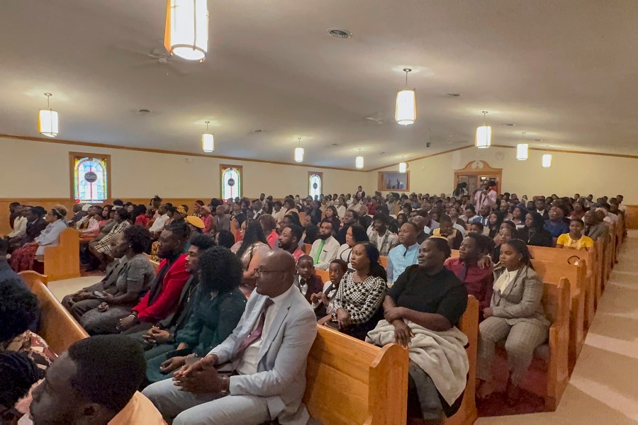 Congregants attend Eglise Porte Etroite, a Creole-language church which has gone from seven attendees to close to 300 in under 15 years, in Albertville, Ala., Sept. 29, 2024. (AP Photo/Safiyah Riddle)