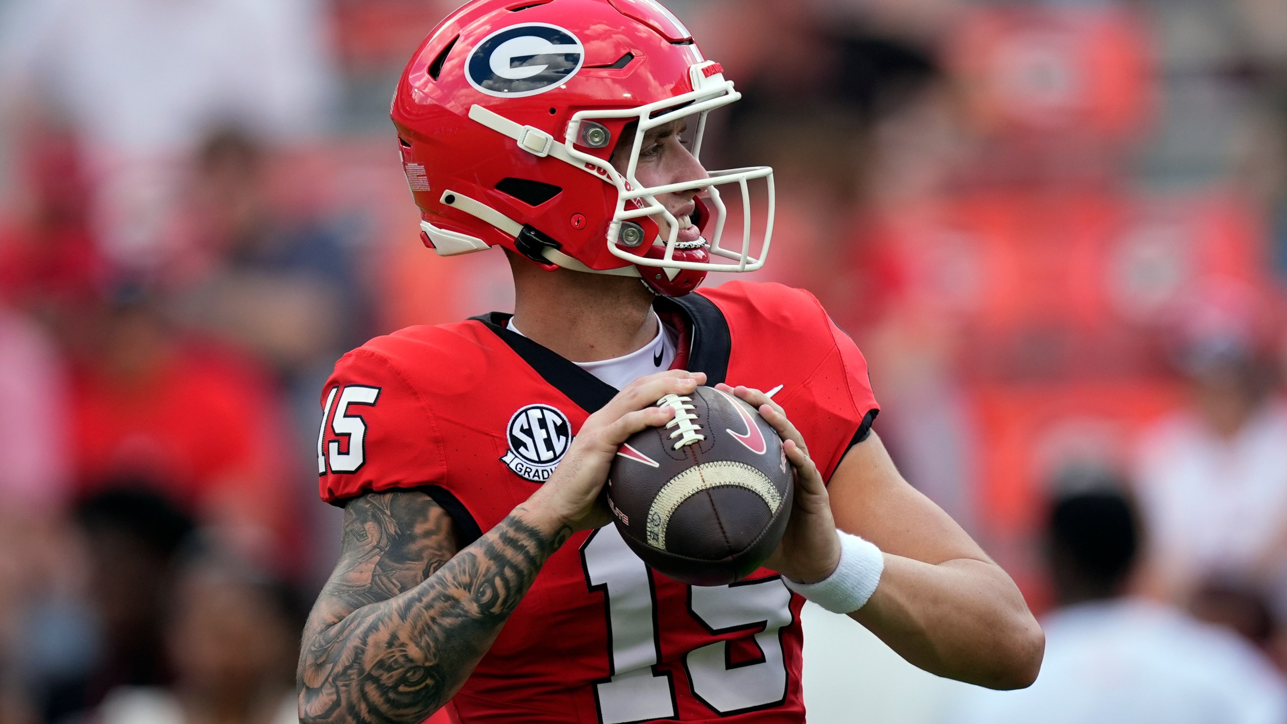 Georgia quarterback Carson Beck warms up before an NCAA college football game against Auburn Saturday, Oct. 5, 2024, in Athens, Ga. (AP Photo/John Bazemore)