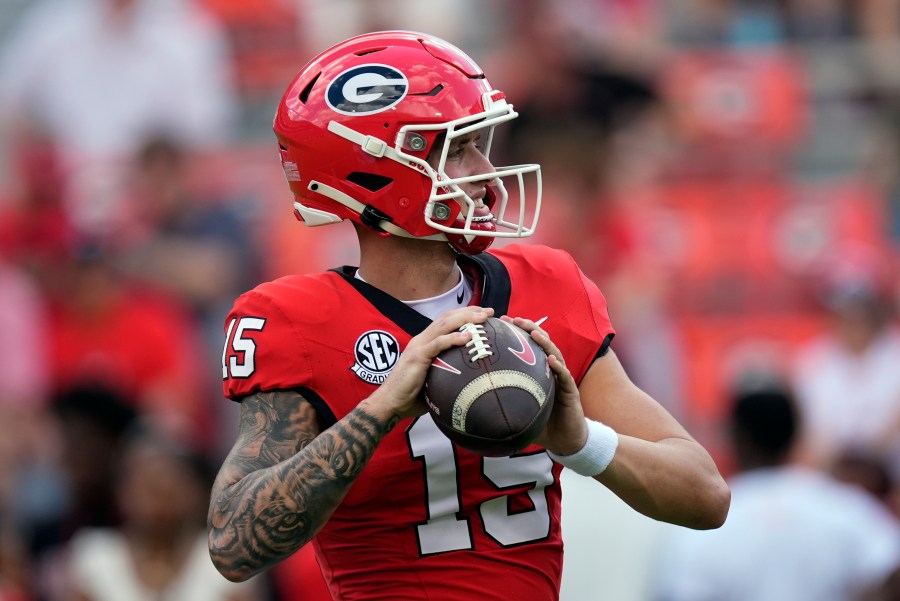 Georgia quarterback Carson Beck warms up before an NCAA college football game against Auburn Saturday, Oct. 5, 2024, in Athens, Ga. (AP Photo/John Bazemore)