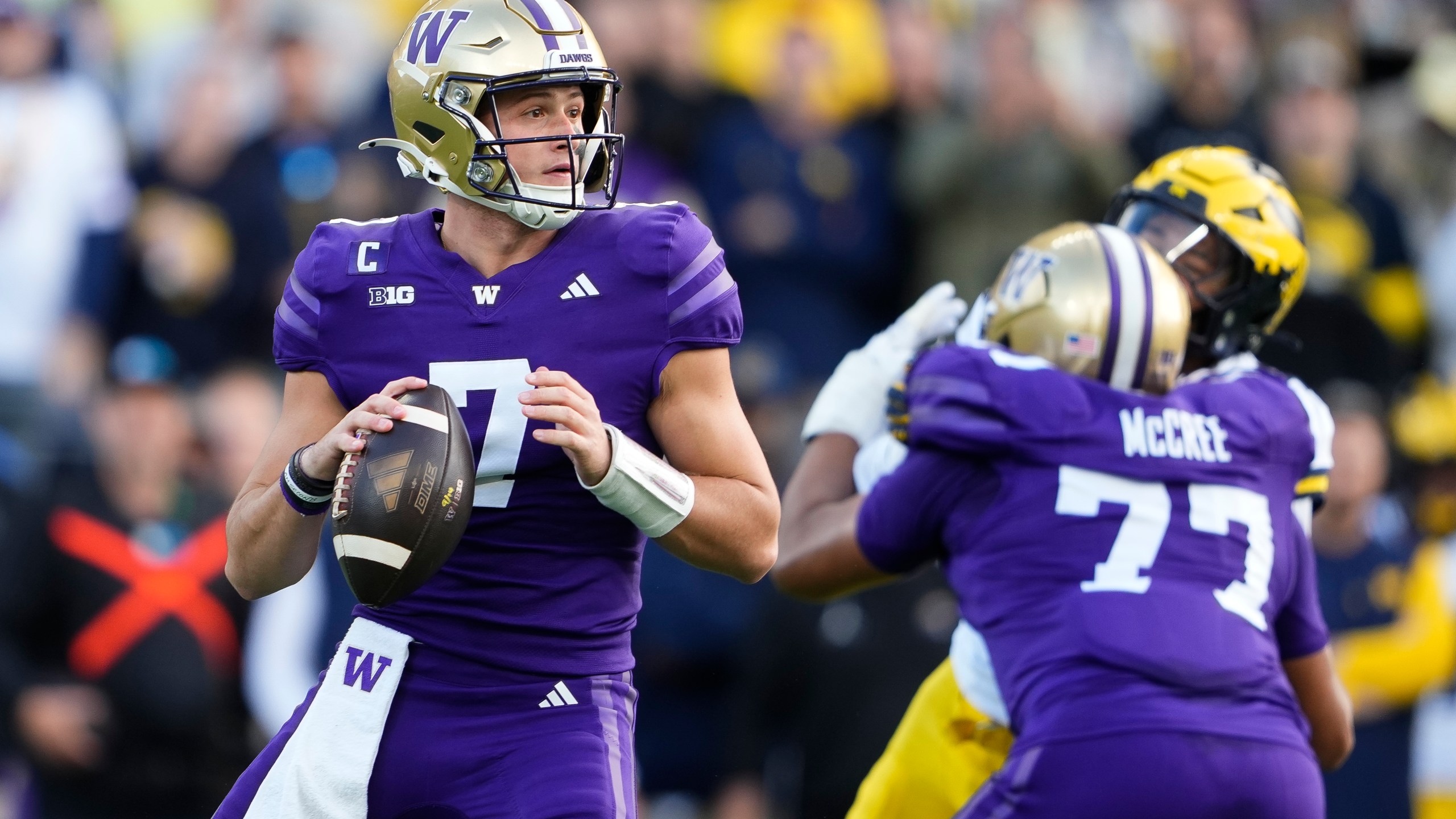 Washington quarterback Will Rogers looks to pass against Michigan during the first half of an NCAA college football game Saturday, Oct. 5, 2024, in Seattle. (AP Photo/Lindsey Wasson)