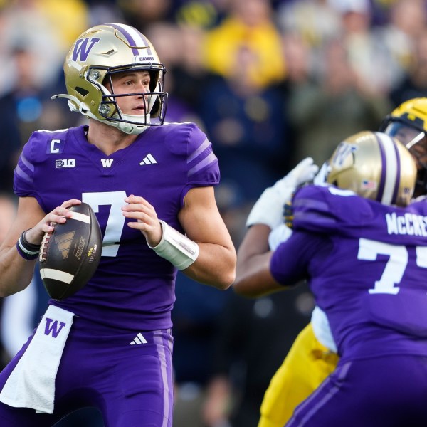 Washington quarterback Will Rogers looks to pass against Michigan during the first half of an NCAA college football game Saturday, Oct. 5, 2024, in Seattle. (AP Photo/Lindsey Wasson)