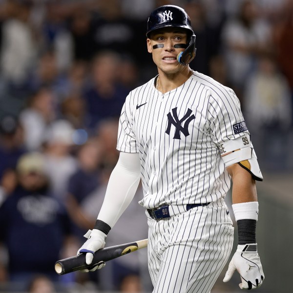 New York Yankees outfielder Aaron Judge (99) reacts after striking out against the Kansas City Royals during the sixth inning of Game 1 of the American League baseball division series, Saturday, Oct. 5, 2024, in New York. (AP Photo/Adam Hunger)