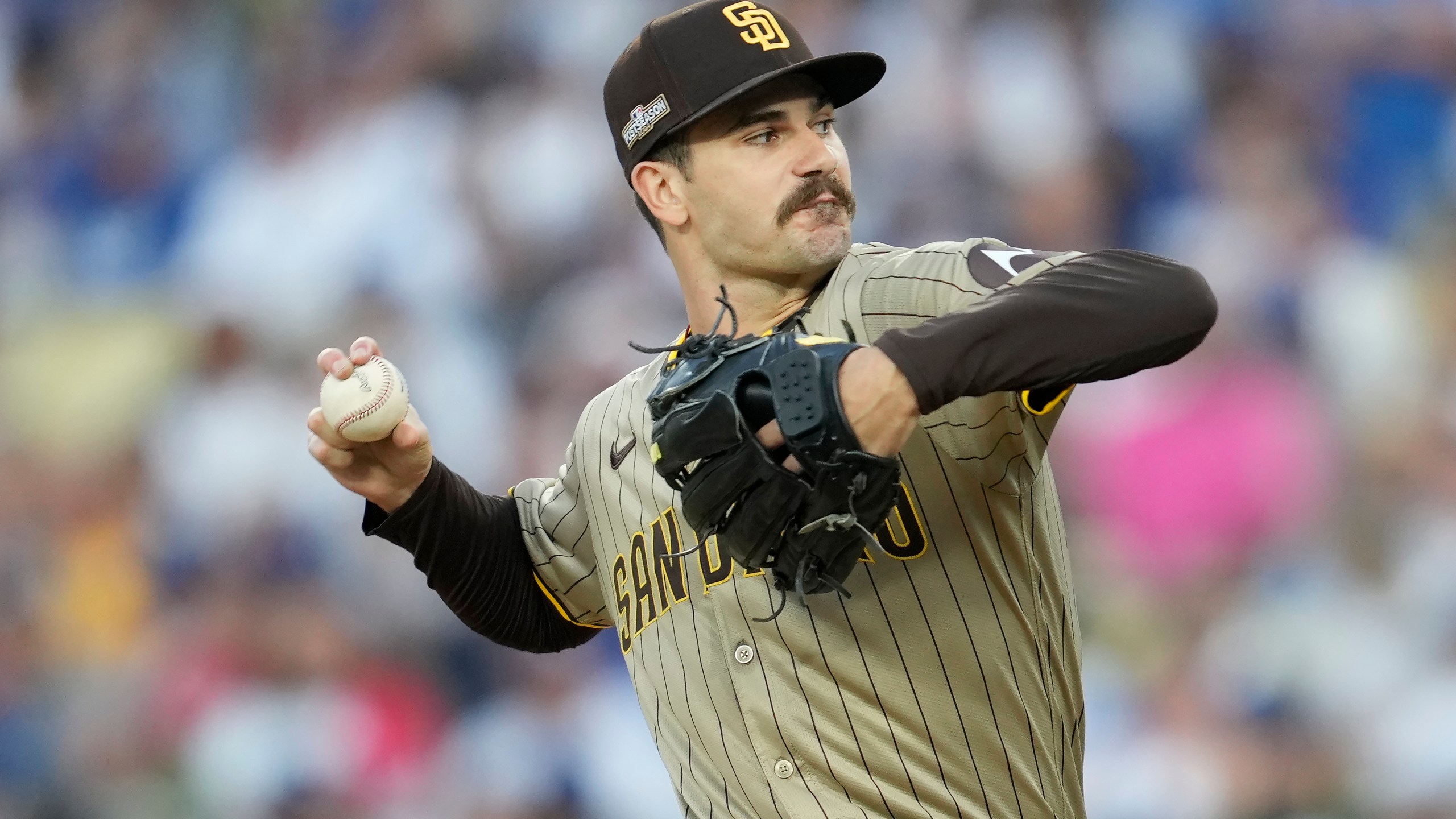 San Diego Padres pitcher Dylan Cease throws to a Los Angeles Dodgers batter during the first inning in Game 1 of baseball's NL Division Series Saturday, Oct. 5, 2024, in Los Angeles. (AP Photo/Ashley Landis)