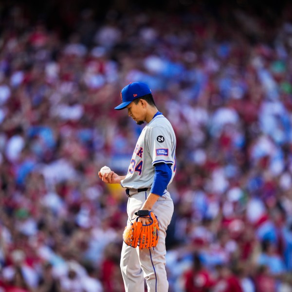 New York Mets Kodai Senga prepares to pitch during the first inning of Game 1 of a baseball NL Division Series against the Philadelphia Phillies, Saturday, Oct. 5, 2024, in Philadelphia. (AP Photo/Matt Slocum)