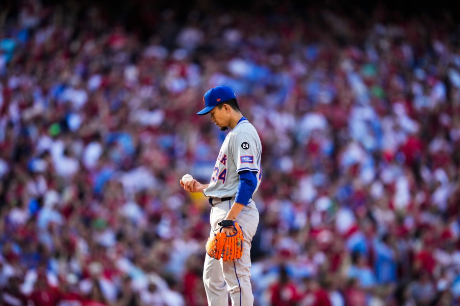 New York Mets Kodai Senga prepares to pitch during the first inning of Game 1 of a baseball NL Division Series against the Philadelphia Phillies, Saturday, Oct. 5, 2024, in Philadelphia. (AP Photo/Matt Slocum)