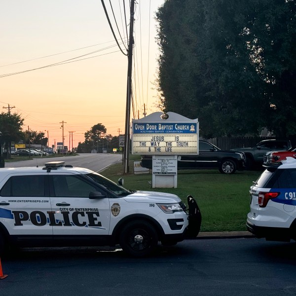 A sign at Open Door Baptist Church, where residents gather to discuss a recent increase in Haitian migrants in the area, is pictured in Enterprise, Ala., Sept. 19, 2024. (AP Photo/Safiyah Riddle)