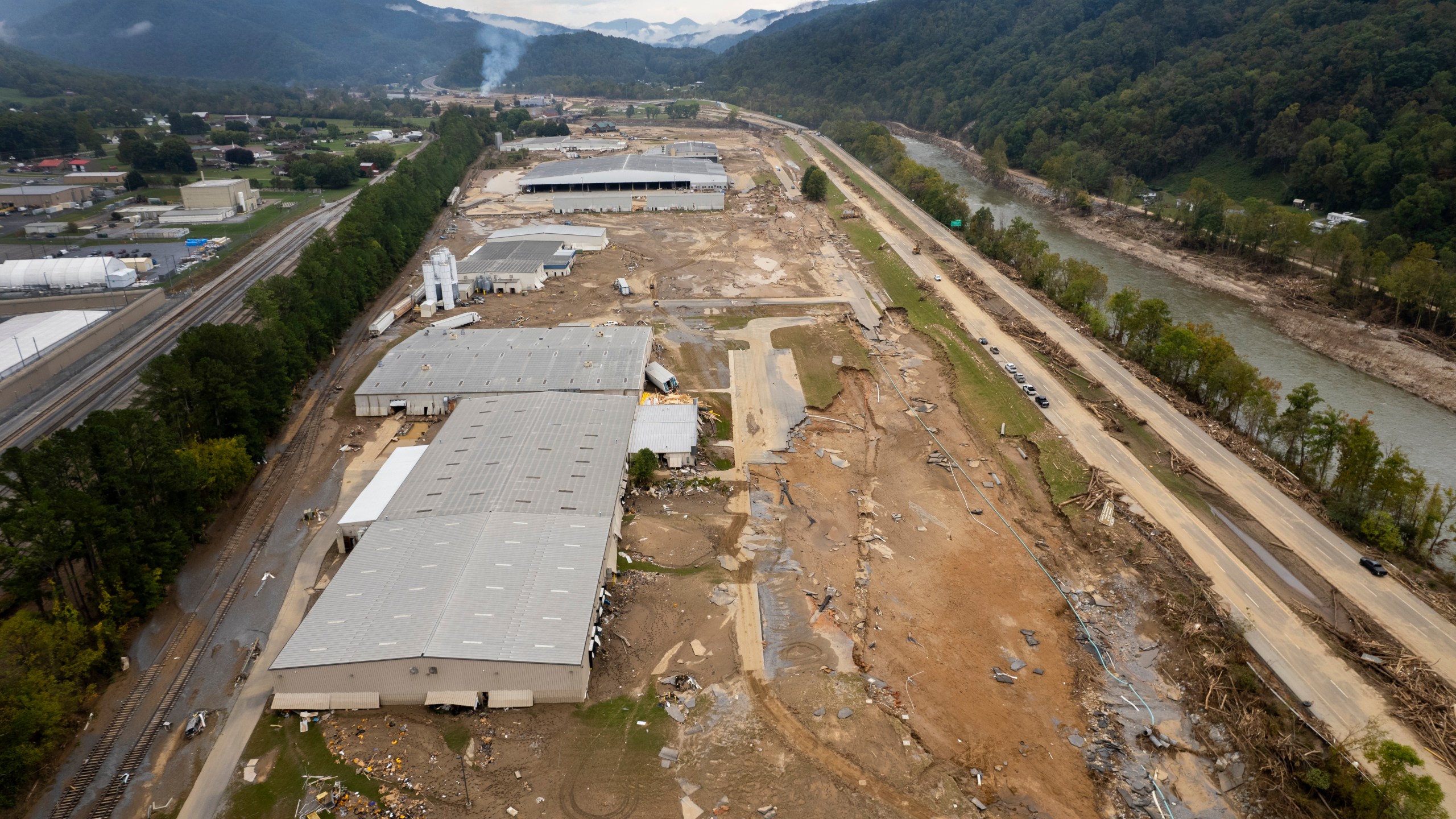 Damage caused by flooding from Hurricane Helene is seen around Impact Plastics in Erwin, Tenn., on Friday, Oct. 4, 2024. (AP Photo/Jeff Roberson)