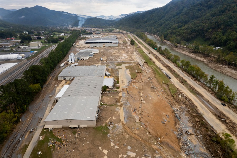 Damage caused by flooding from Hurricane Helene is seen around Impact Plastics in Erwin, Tenn., on Friday, Oct. 4, 2024. (AP Photo/Jeff Roberson)