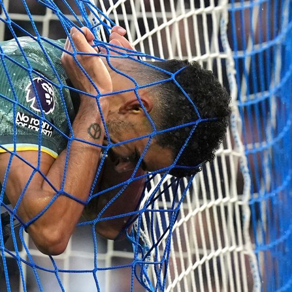 Tottenham Hotspur's Dominic Solanke rues a missed chance during the Premier League match at the American Express Stadium, Brighton, England, Sunday Oct. 6, 2024. (Gareth Fuller/PA via AP)