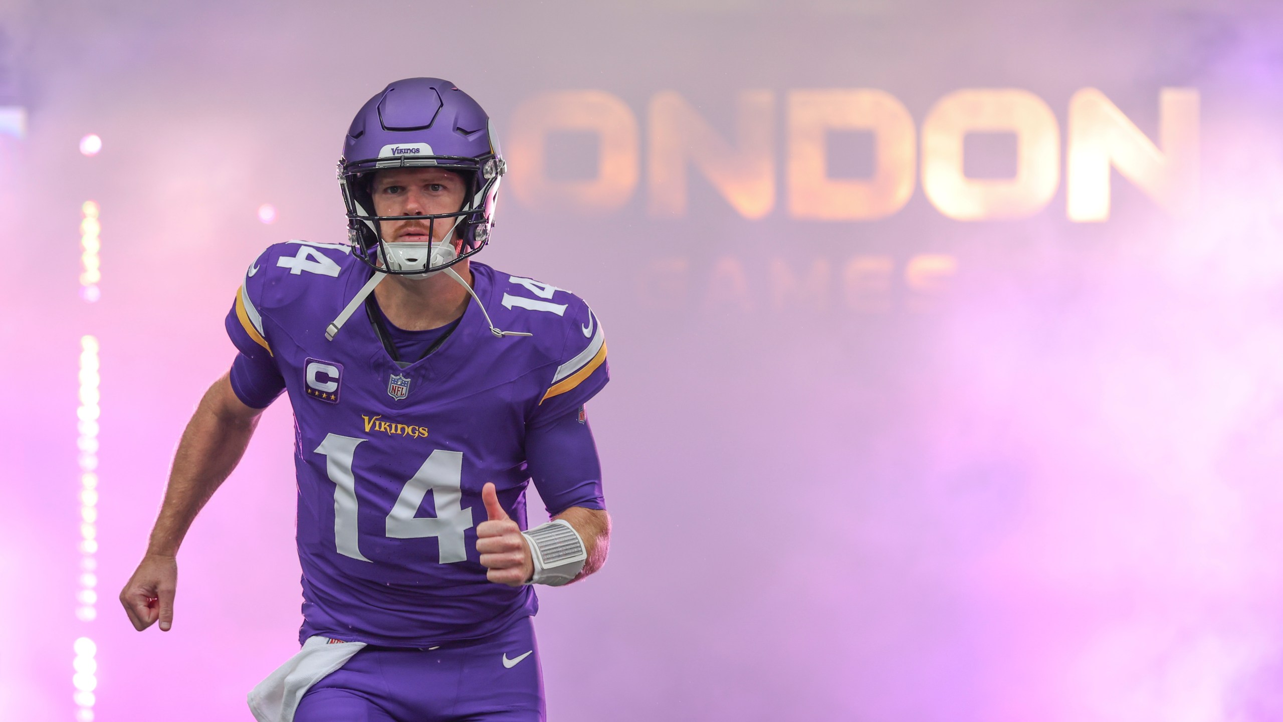 Minnesota Vikings quarterback Sam Darnold is introduced before an NFL football game against the New York Jets, Sunday, Oct. 6, 2024, at the Tottenham Hotspur stadium in London. (AP Photo/Ian Walton)