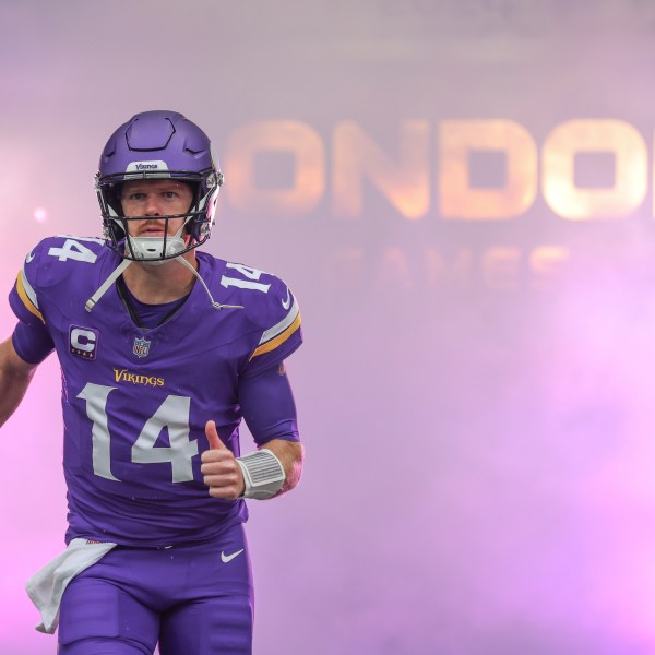 Minnesota Vikings quarterback Sam Darnold is introduced before an NFL football game against the New York Jets, Sunday, Oct. 6, 2024, at the Tottenham Hotspur stadium in London. (AP Photo/Ian Walton)