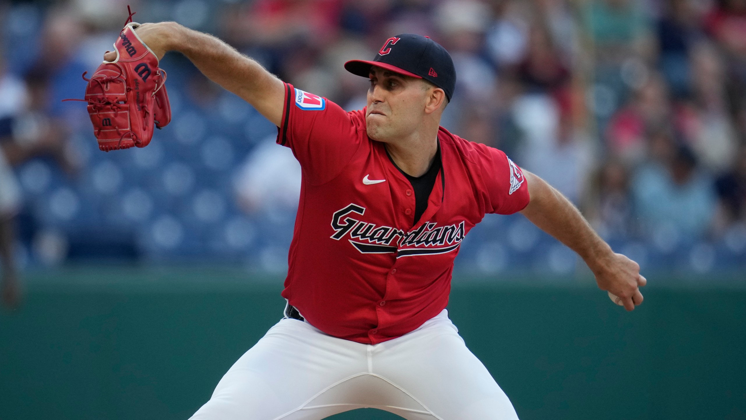 FILE -Cleveland Guardians' Matthew Boyd pitches in the first inning of a baseball game against the Minnesota Twins, Monday, Sept. 16, 2024, in Cleveland. (AP Photo/Sue Ogrocki, File)