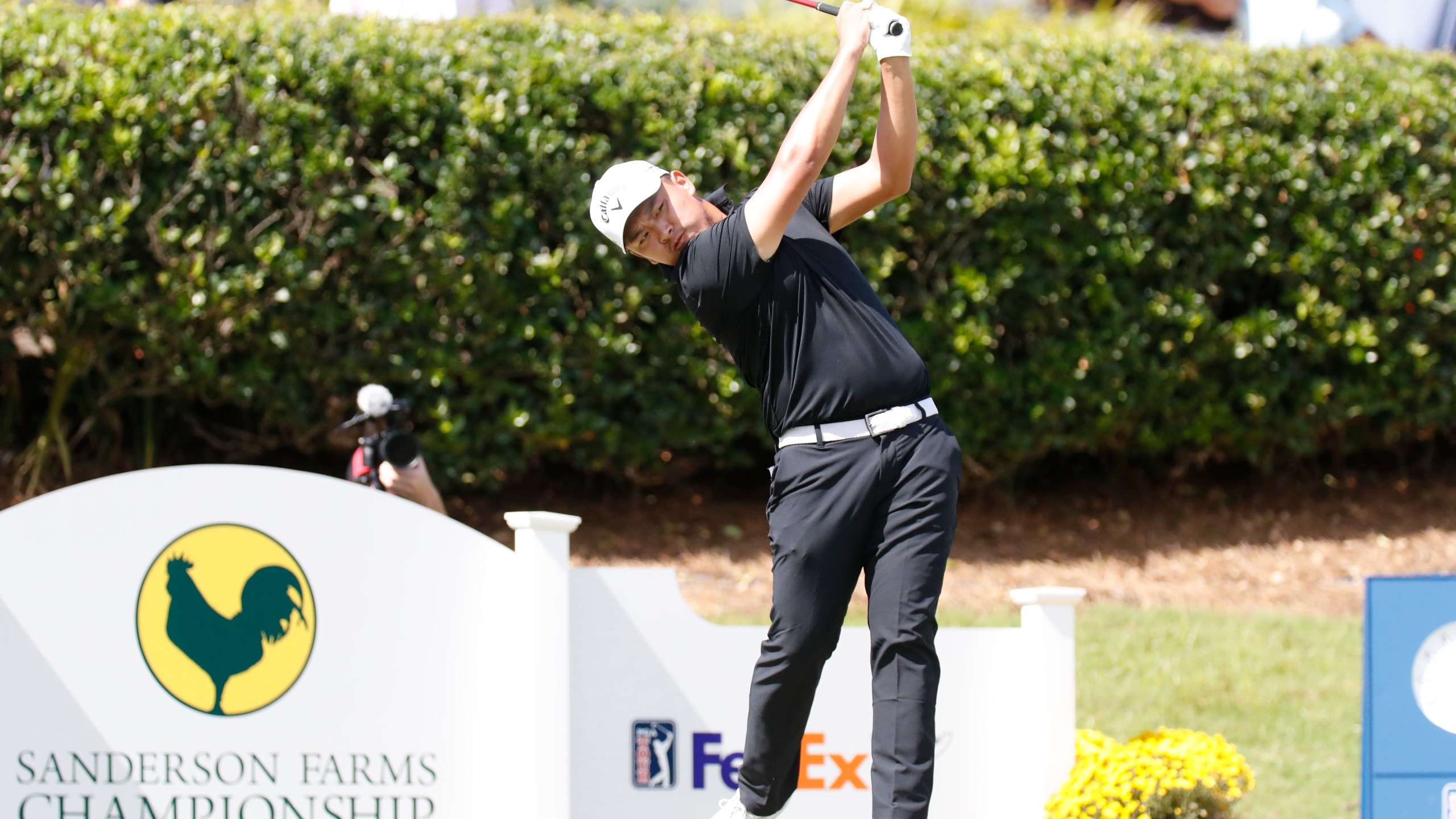 Kevin Yu watches his ball after teeing off from the first hole during the fourth round of the 2024 Sanderson Farms Championship at the Country Club of Jackson on Oct. 06, 2024, in Jackson, Miss. (AP Photo/Sarah Warnock).