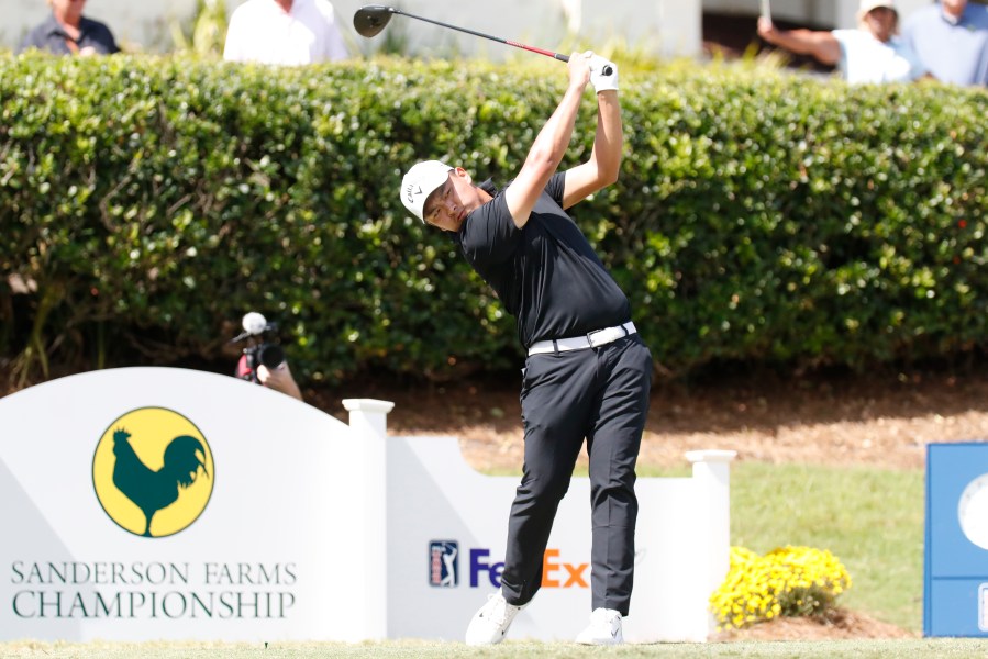 Kevin Yu watches his ball after teeing off from the first hole during the fourth round of the 2024 Sanderson Farms Championship at the Country Club of Jackson on Oct. 06, 2024, in Jackson, Miss. (AP Photo/Sarah Warnock).