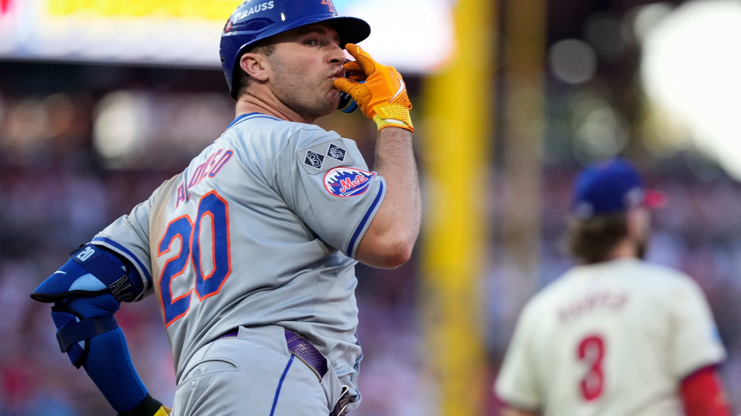 New York Mets' Pete Alonso reacts after hitting a home run against Philadelphia Phillies pitcher José Ruiz during the sixth inning of Game 2 of a baseball NL Division Series, Sunday, Oct. 6, 2024, in Philadelphia. (AP Photo/Matt Slocum)