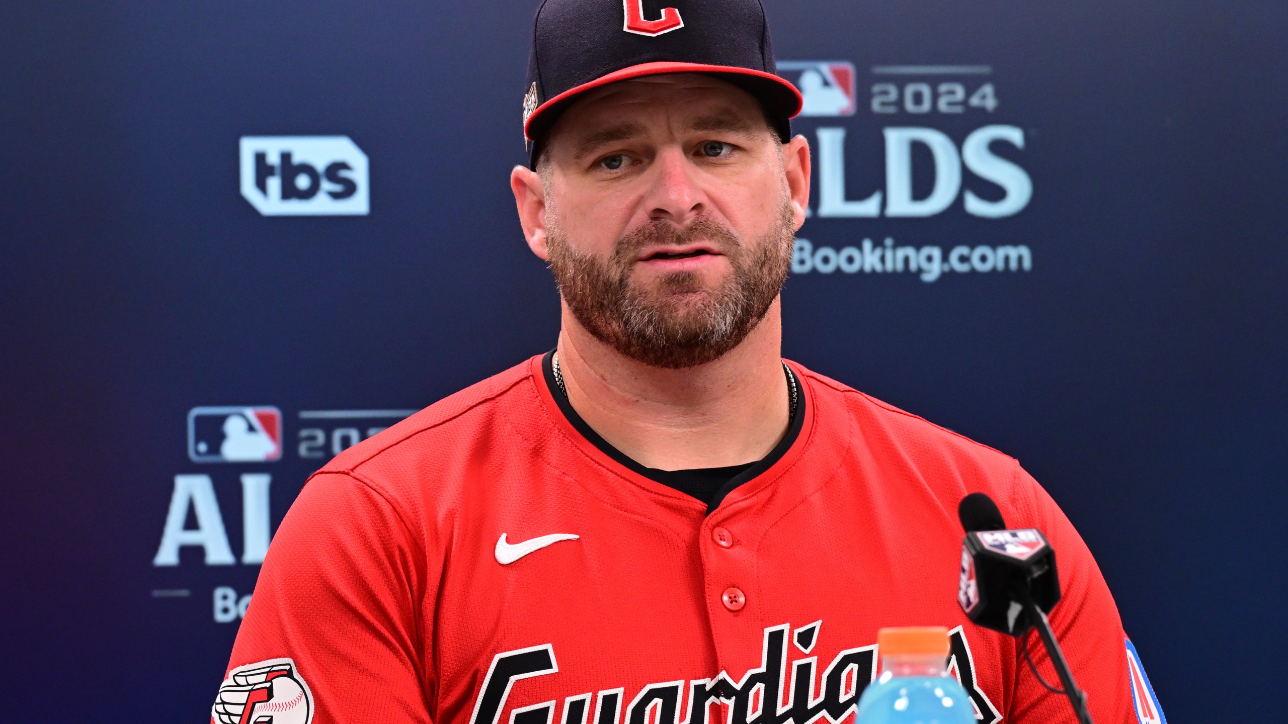 Cleveland Guardians manager Stephen Vogt speaks during a news conference following Game 1 of baseball's AL Division Series between the Detroit Tigers and the Cleveland Guardians, Saturday, Oct. 5, 2024, in Cleveland. (AP Photo/David Dermer)