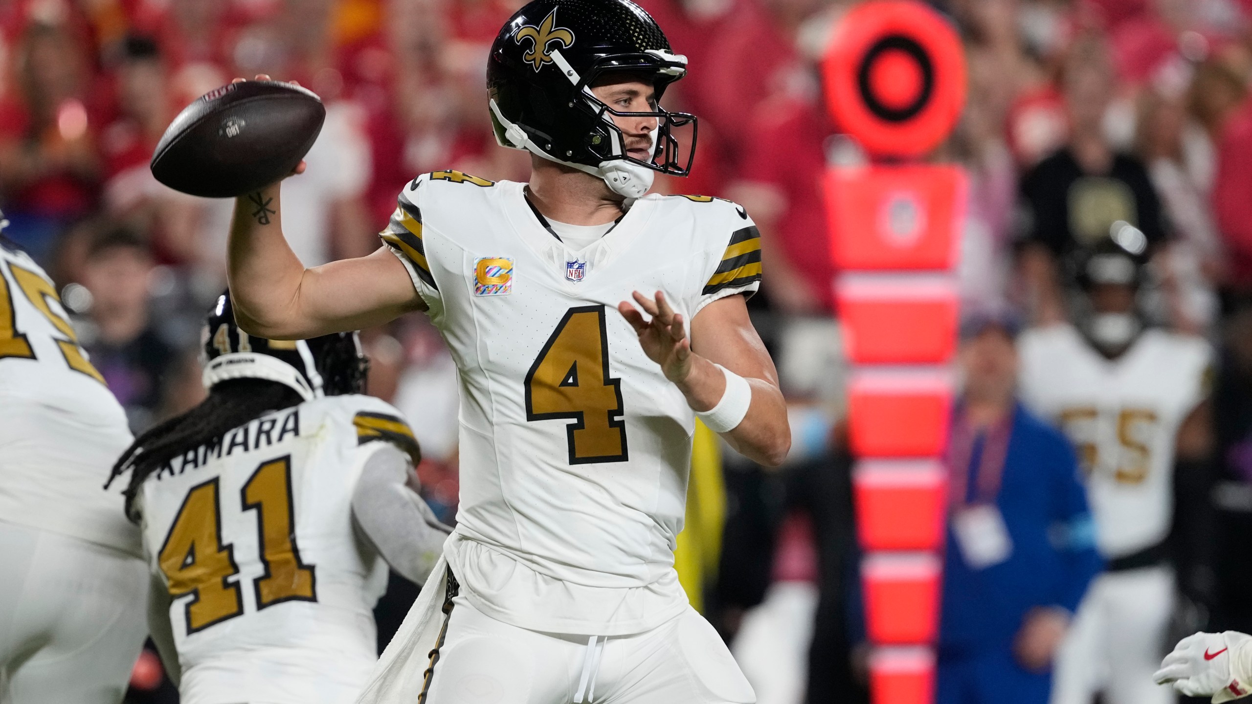 New Orleans Saints quarterback Derek Carr throws during the first half of an NFL football game against the Kansas City Chiefs Monday, Oct. 7, 2024, in Kansas City, Mo. (AP Photo/Ed Zurga)