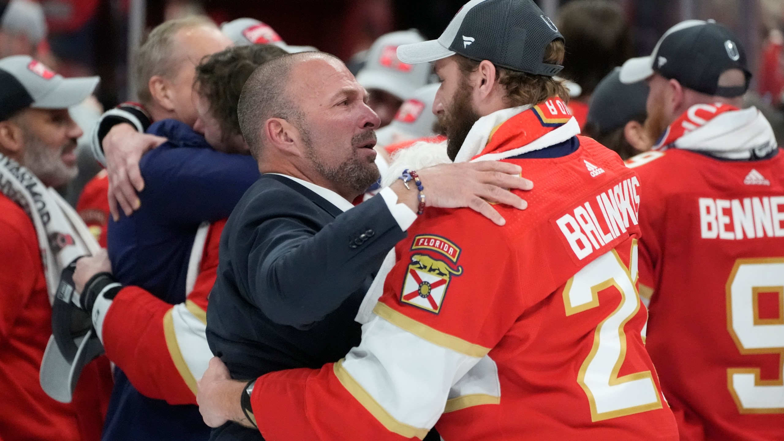 FILE - Florida Panthers general manager Bill Zito talks to defenseman Uvis Balinskis (26) after Game 7 of the NHL hockey Stanley Cup Final against the Edmonton Oilers, on June 24, 2024, in Sunrise, Fla. (AP Photo/Wilfredo Lee, File)