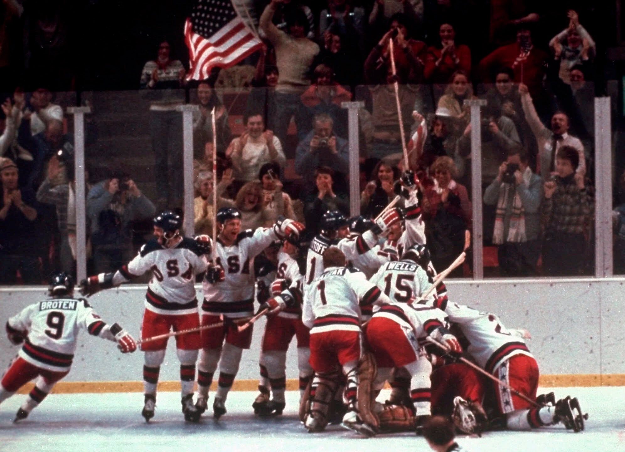 FILE - In this Feb. 22, 1980, file photo, the U.S. hockey team celebrates with goalie Jim Craig after a 4-3 victory against the Soviet Union in a medal round match at the the 1980 Winter Olympics in Lake Placid, N.Y. (AP Photo/File)