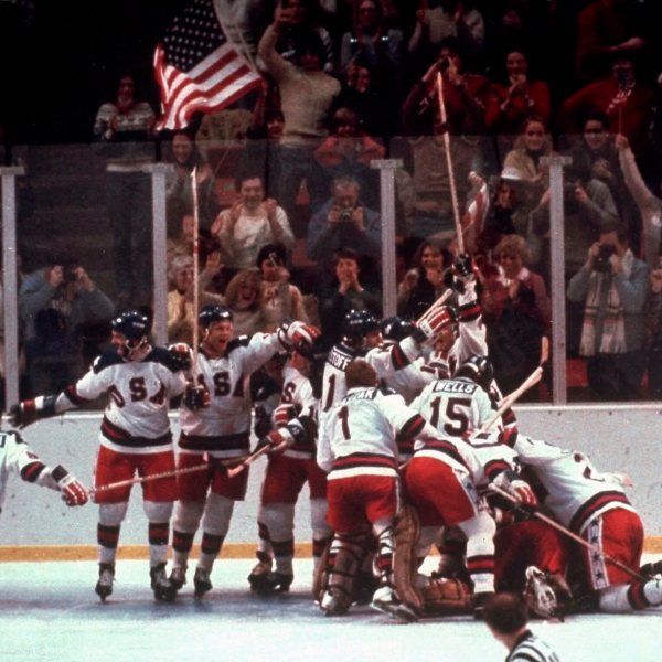 FILE - In this Feb. 22, 1980, file photo, the U.S. hockey team celebrates with goalie Jim Craig after a 4-3 victory against the Soviet Union in a medal round match at the the 1980 Winter Olympics in Lake Placid, N.Y. (AP Photo/File)