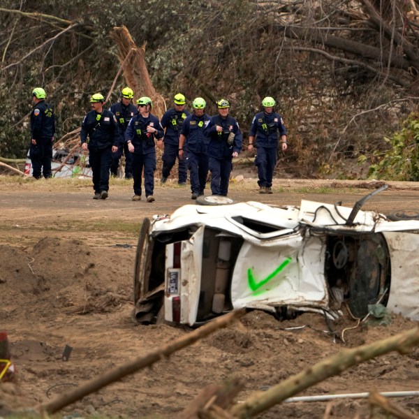 FILE - Personnel from Urban Search and Rescue Utah Task Force 1 work in the aftermath of Hurricane Helene, Friday, Oct. 4, 2024, in Erwin, Tenn. (AP Photo/Jeff Roberson, File)