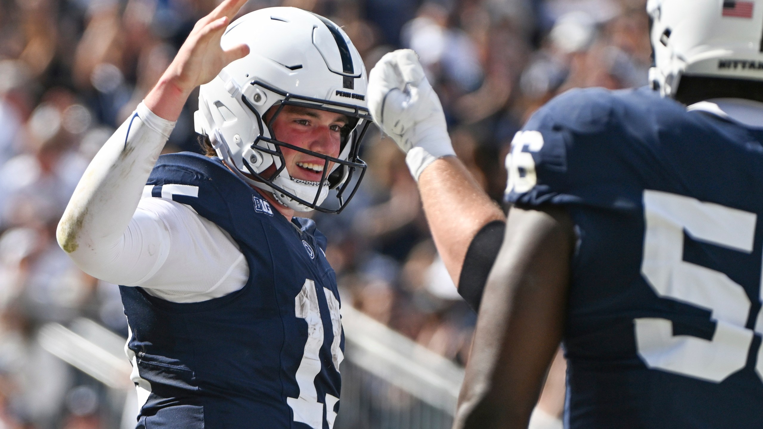 Penn State quarterback Drew Allar (15) celebrates a touchdown during the first half of an NCAA college football game against UCLA Saturday, Oct. 5, 2024, in State College, Pa. (AP Photo/Barry Reeger)