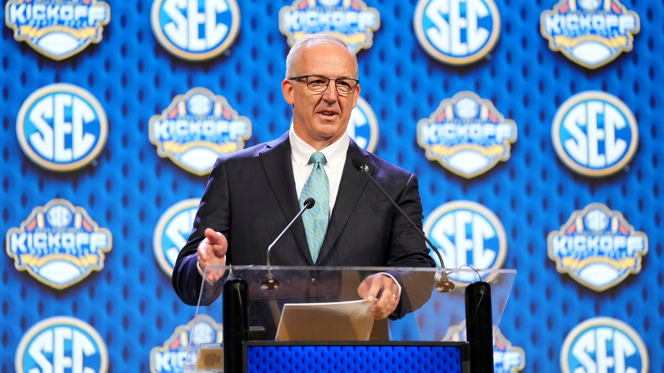 FILE - Southeastern Conference commissioner Greg Sankey speaks during SEC NCAA college football media days, July 15, 2024, in Dallas. (AP Photo/Jeffrey McWhorter, File)