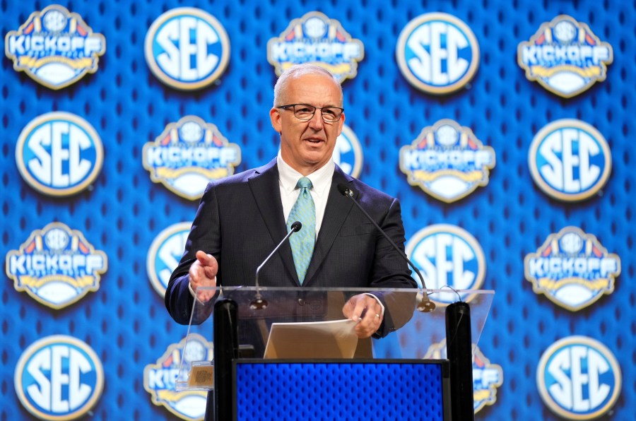 FILE - Southeastern Conference commissioner Greg Sankey speaks during SEC NCAA college football media days, July 15, 2024, in Dallas. (AP Photo/Jeffrey McWhorter, File)