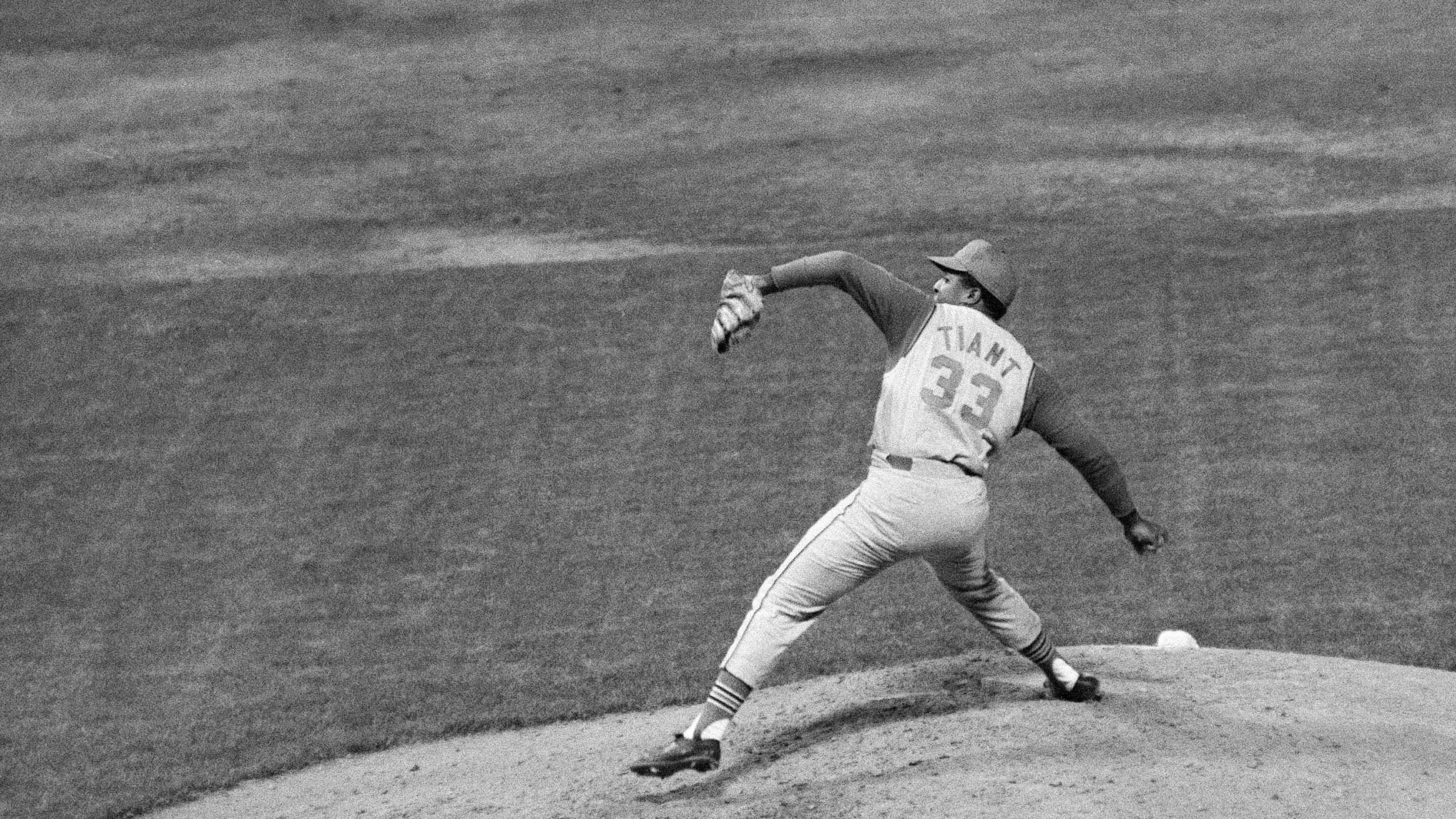 FILE - Luis Tiant of the Cleveland Indians pitches against the New York Yankees in the fourth inning at Yankee Stadium in 1968. (AP Photo/Marty Lederhandler, File)