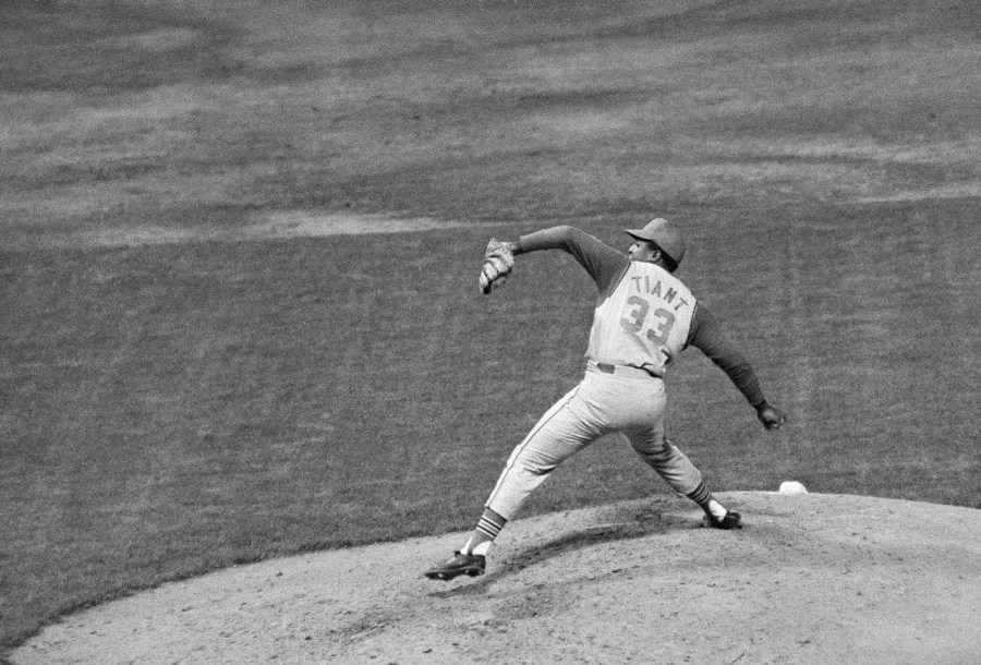 FILE - Luis Tiant of the Cleveland Indians pitches against the New York Yankees in the fourth inning at Yankee Stadium in 1968. (AP Photo/Marty Lederhandler, File)