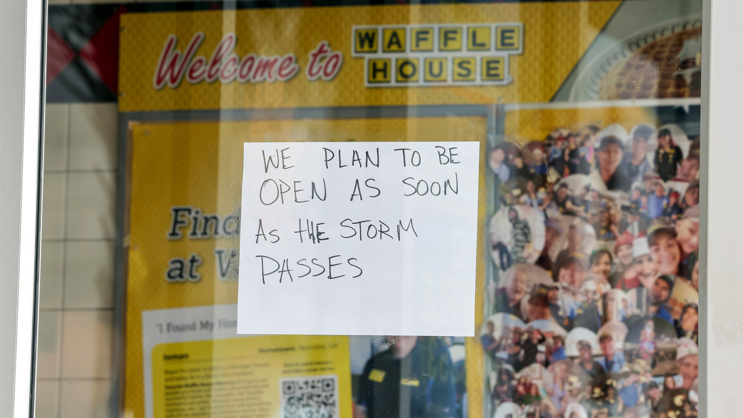 A sign on a closed Waffle House on Highway US 19 in anticipation of Hurricane Milton on Tuesday, Oct. 8, 2024, in New Port Richey, Fla. (AP Photo/Mike Carlson)