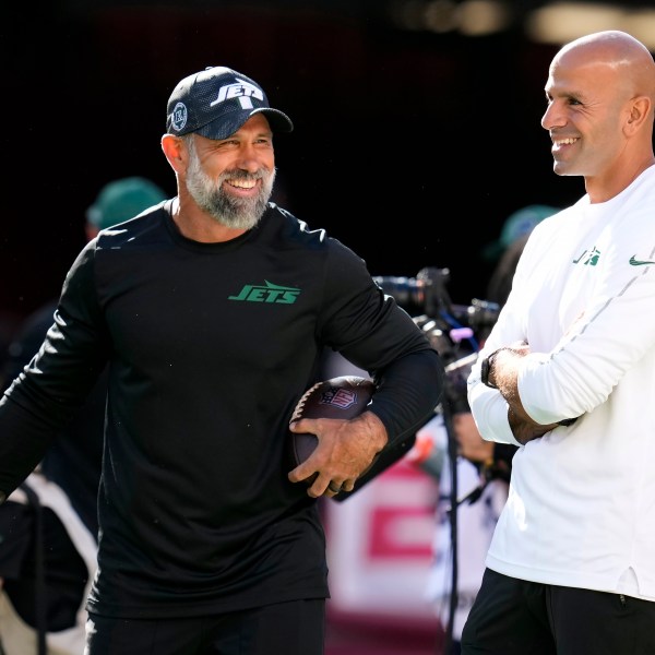 FILE - New York Jets head coach Robert Saleh, right, talks with defensive coordinator Jeff Ulbrich before an NFL football game against the San Francisco 49ers in Santa Clara, Calif., Monday, Sept. 9, 2024. (AP Photo/Godofredo A. Vásquez, File)