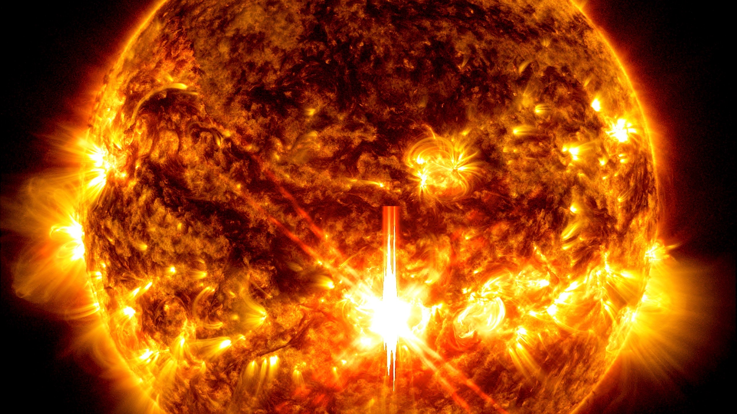 FILE - This photo provided by NASA, taken by the Solar Dynamics Observatory, shows a solar flare, the bright flash in the center of the image on Oct. 3, 2024. (Solar Dynamics Observatory/NASA via AP, file)