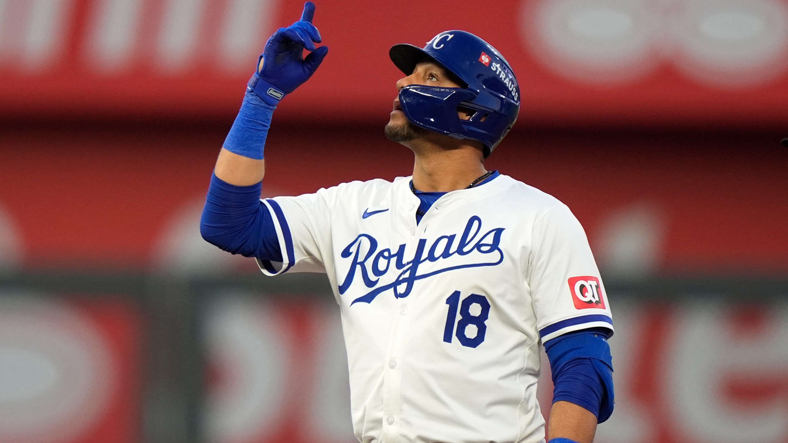 Kansas City Royals' Yuli Gurriel celebrates after hitting a double during the second inning in Game 3 of an American League Division baseball playoff series against the New York Yankees Wednesday, Oct. 9, 2024, in Kansas City, Mo. (AP Photo/Charlie Riedel)