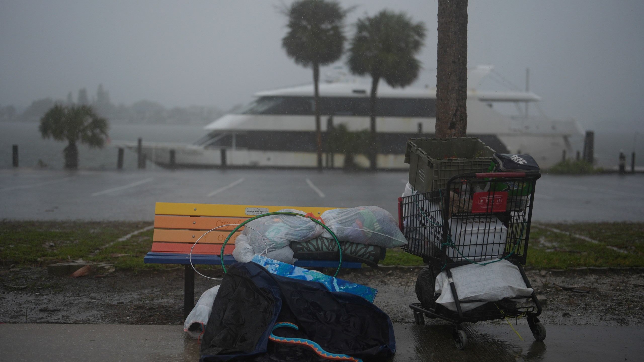 Personal items sit abandoned on the side of a road on Deadman Key, ahead of the arrival of Hurricane Milton, in South Pasadena, Fla., Wednesday, Oct. 9, 2024. (AP Photo/Rebecca Blackwell)