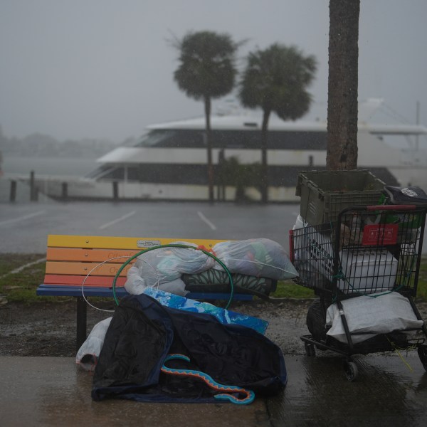 Personal items sit abandoned on the side of a road on Deadman Key, ahead of the arrival of Hurricane Milton, in South Pasadena, Fla., Wednesday, Oct. 9, 2024. (AP Photo/Rebecca Blackwell)