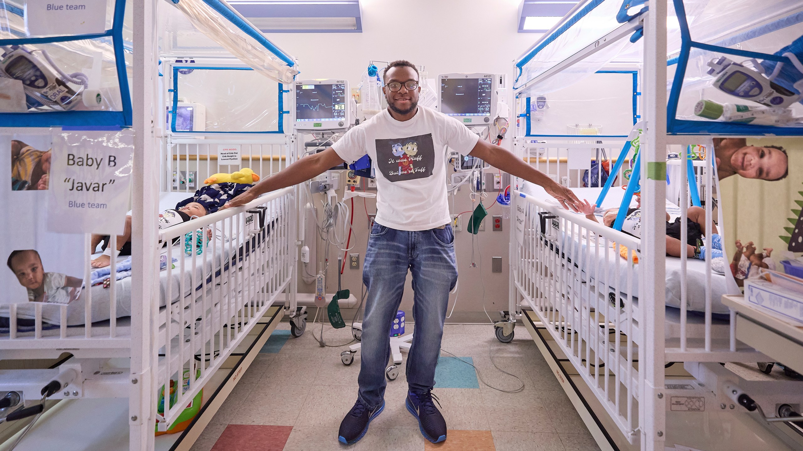 This undated photo provided by the Children’s Hospital of Philadelphia in October 2024 shows Tim Ruffin with his previously conjoined twins, after eparation surgery at the Children’s Hospital of Philadelphia. (Ed Cunicelli/Children’s Hospital of Philadelphia via AP)