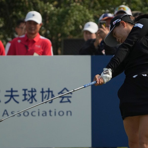 Minami Katsu of Japan tees off on the first hole during the first round of the Buick LPGA Shanghai at Shanghai Qizhong Garden Golf Club in Shanghai, China, Thursday, Oct. 10, 2024. (AP Photo/Achmad Ibrahim)