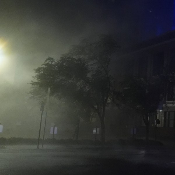 Wind-driven rain soaks a street in downtown Tampa, Fla., during the passage of Hurricane Milton, Wednesday, Oct. 9, 2024. (AP Photo/Rebecca Blackwell)