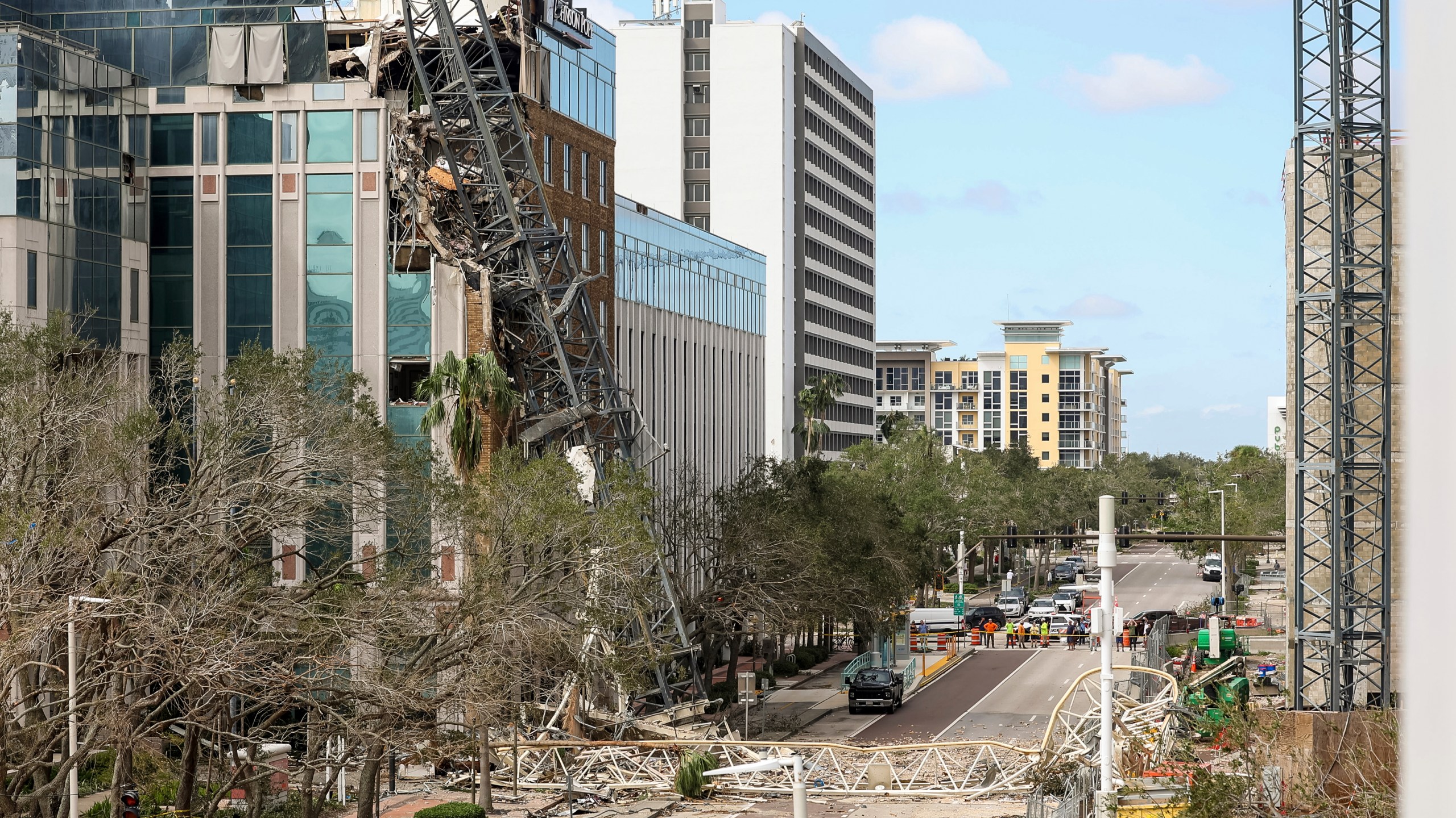 A high rise construction crane broke apart and crashed into the building across the street during Hurricane Milton on Thursday, Oct. 10, 2024, in St. Petersburg, Fla. (AP Photo/Mike Carlson)