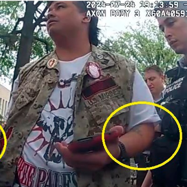 This image from police-worn body camera, and provided and annotated by the Justice Department, in the affidavit to support the criminal complaint and arrest warrant for Zachary Allen Kam, shows Kim during his arrest July 24, 2024, in Washington. (Department of Justice via AP)