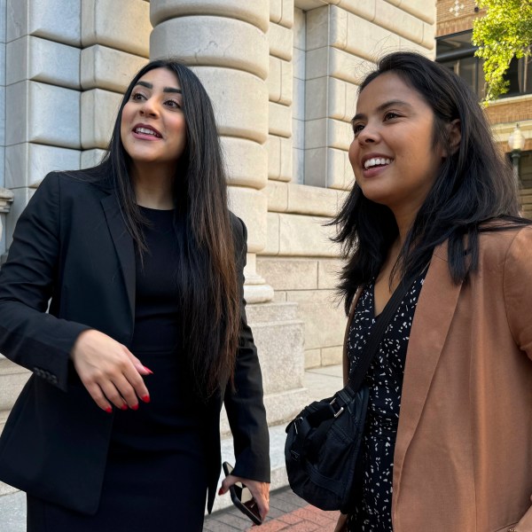 DACA-recipient María Rocha-Carrillo, 37, greets supporters outside federal appellate court in New Orleans on Thursday, Oct. 10, 2024. (AP Photo/Jack Brook)