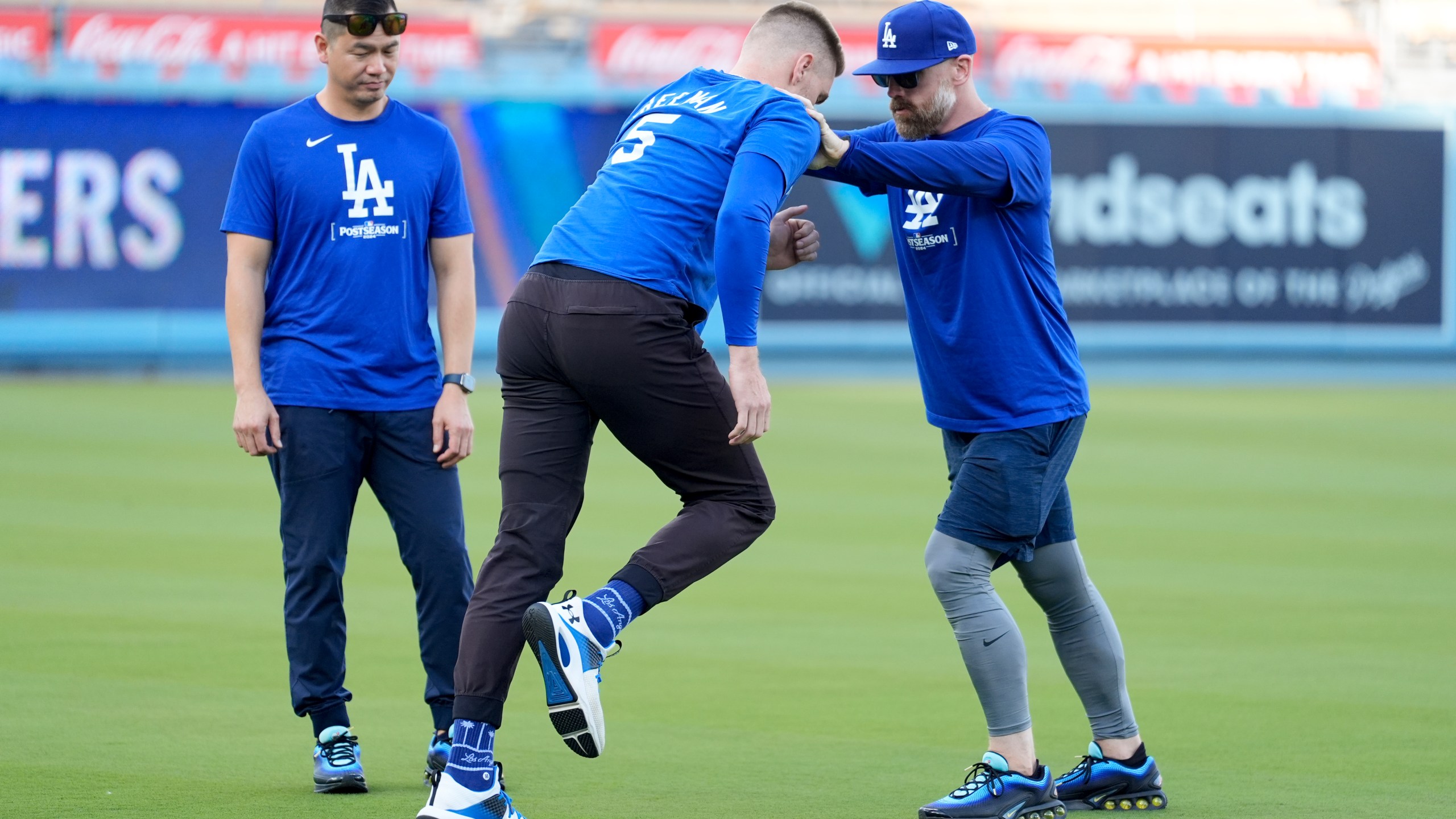 Los Angeles Dodgers' Freddie Freeman (5) works out ahead of Game 5 of a baseball NL Division Series against the San Diego Padres, Thursday, Oct. 10, 2024, in Los Angeles. (AP Photo/Ashley Landis)