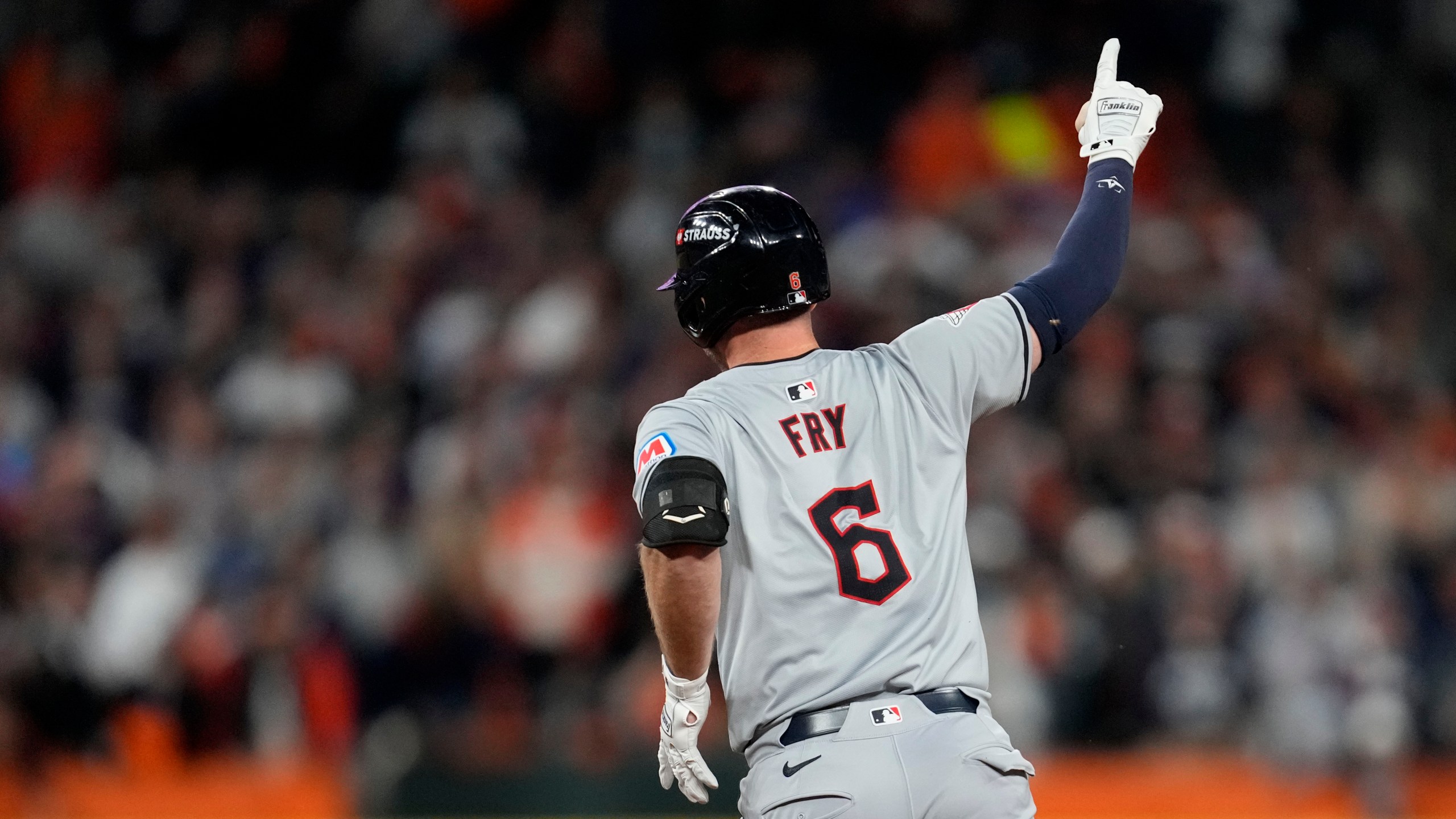 Cleveland Guardians' David Fry celebrates after hitting a two-run home run in the seventh inning during Game 4 of a baseball American League Division Series against the Detroit Tigers, Thursday, Oct. 10, 2024, in Detroit. (AP Photo/Paul Sancya)