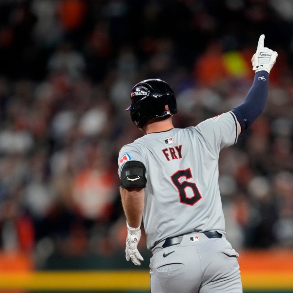 Cleveland Guardians' David Fry celebrates after hitting a two-run home run in the seventh inning during Game 4 of a baseball American League Division Series against the Detroit Tigers, Thursday, Oct. 10, 2024, in Detroit. (AP Photo/Paul Sancya)