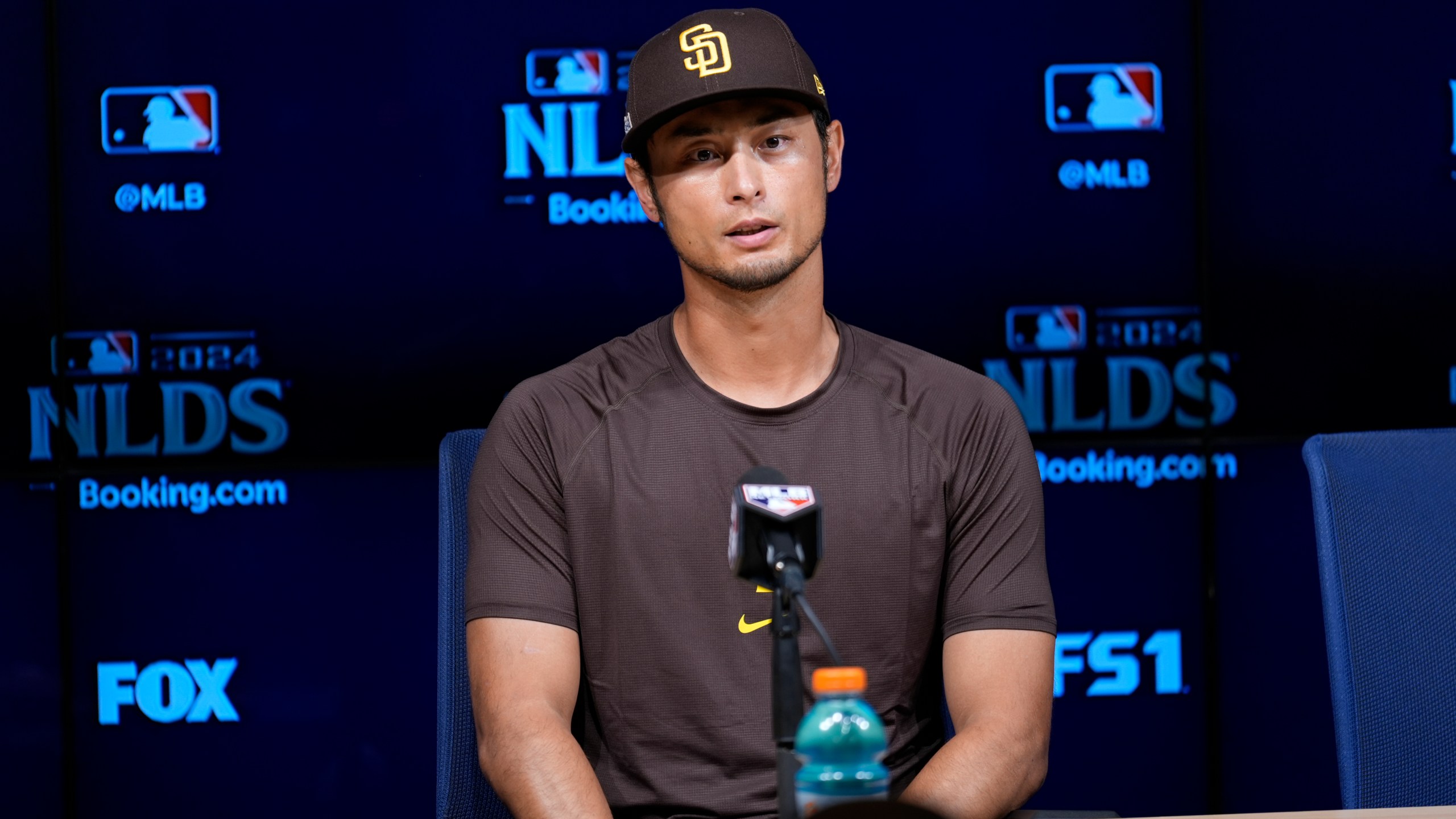 San Diego Padres pitcher Yu Darvish fields questions ahead of Game 5 of a baseball National League Division Series against the Los Angeles Dodgers, Thursday, Oct. 10, 2024, in Los Angeles. (AP Photo/Ashley Landis)