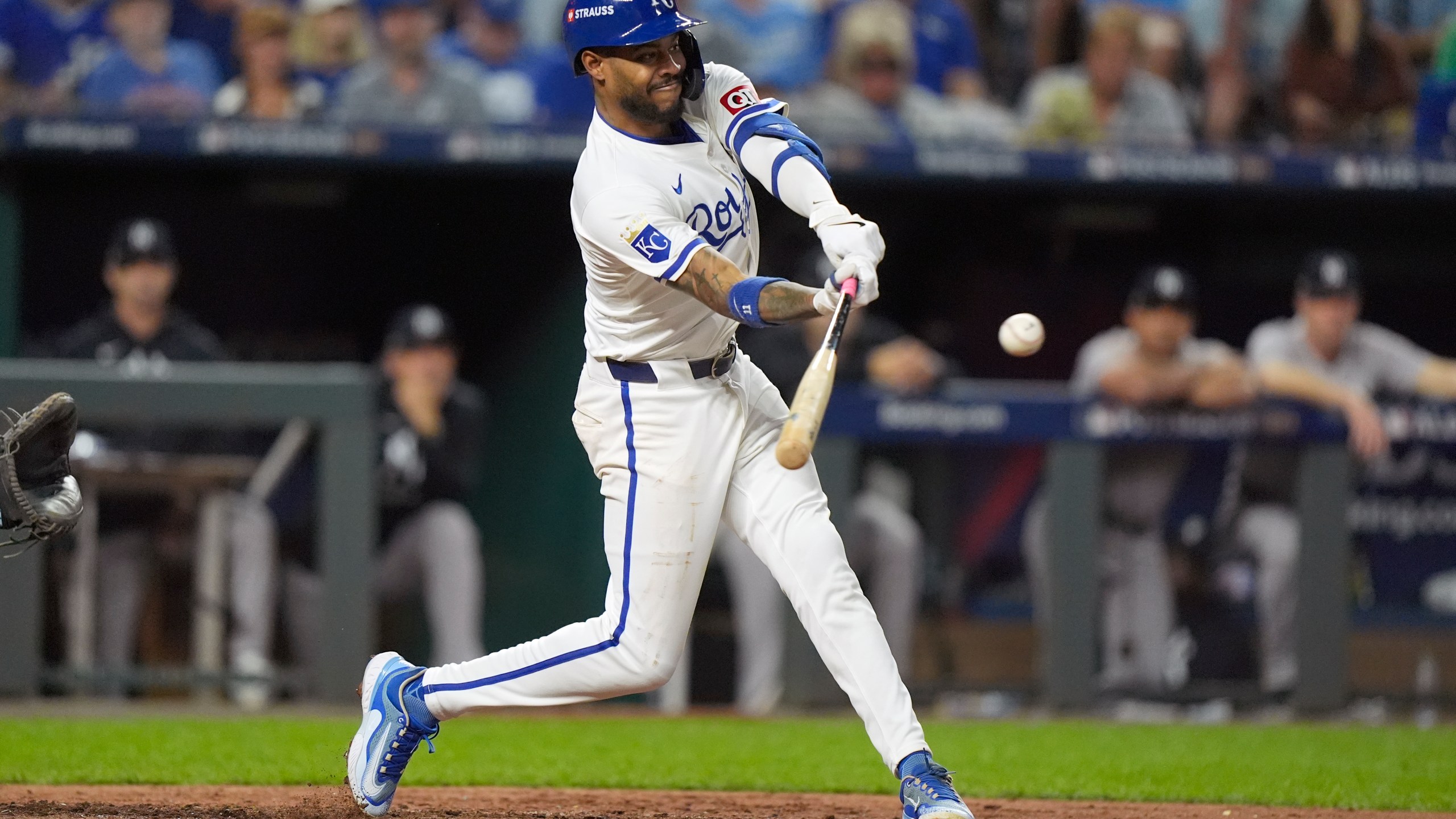 Kansas City Royals' Maikel Garcia singles during the sixth inning in Game 4 of an American League Division baseball playoff series against the New York Yankees Thursday, Oct. 10, 2024, in Kansas City, Mo. (AP Photo/Charlie Riedel)