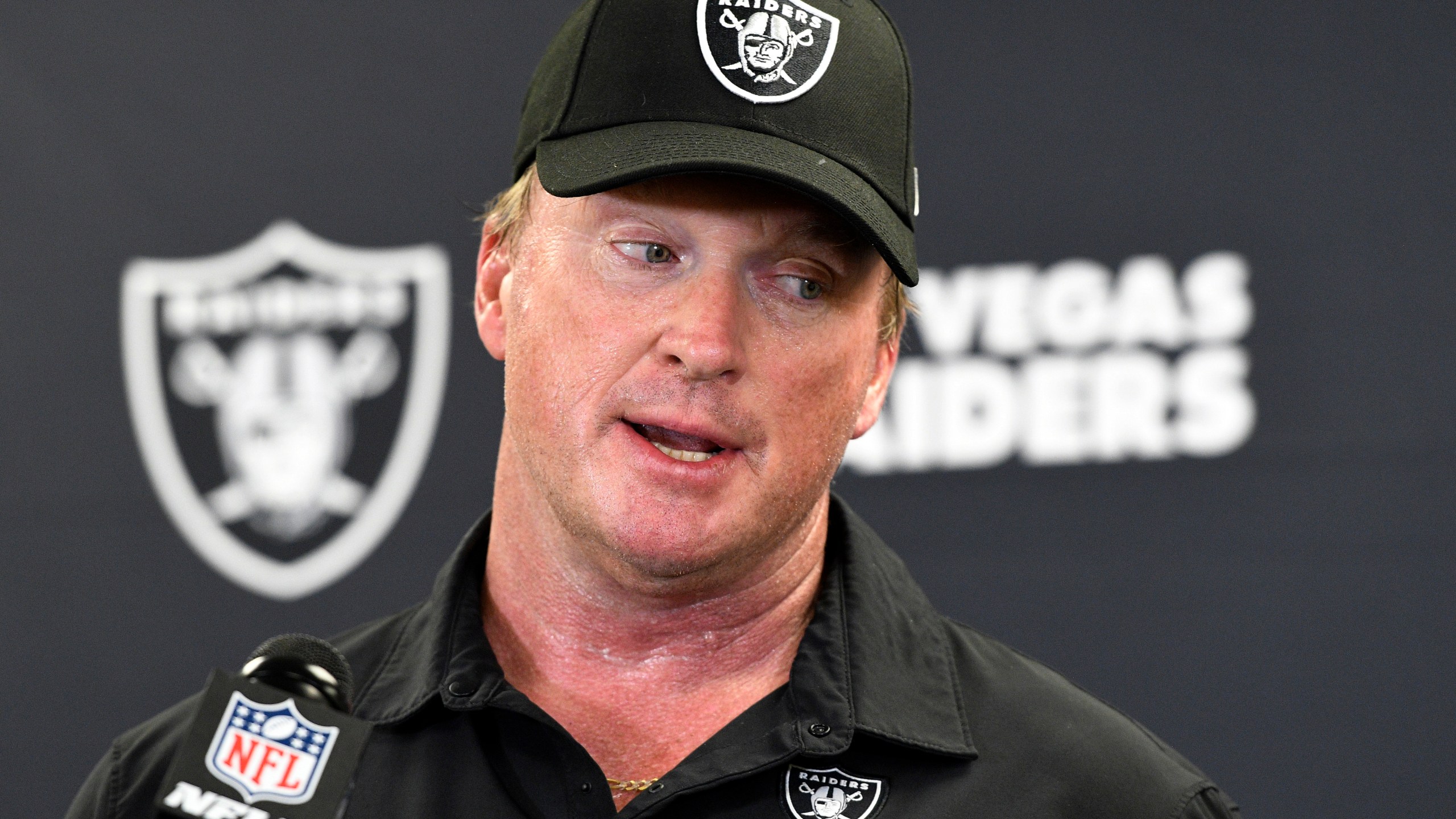 FILE - Las Vegas Raiders head coach Jon Gruden speaks with the media following an NFL football game against the Pittsburgh Steelers in Pittsburgh, Sept. 19, 2021. (AP Photo/Don Wright, File)