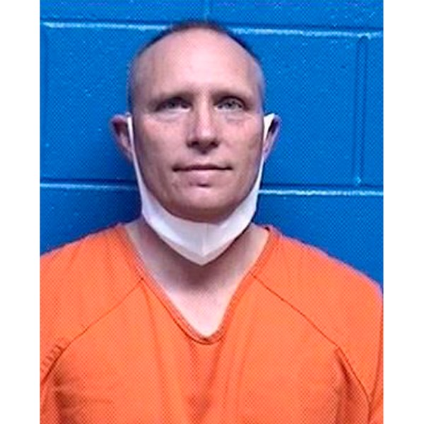 FILE - This booking photo released by the Missoula County, Mont., Detention Facility shows Henry Phillip Muntzer on Jan. 18, 2021. (Missoula County Detention Facility via AP, File)