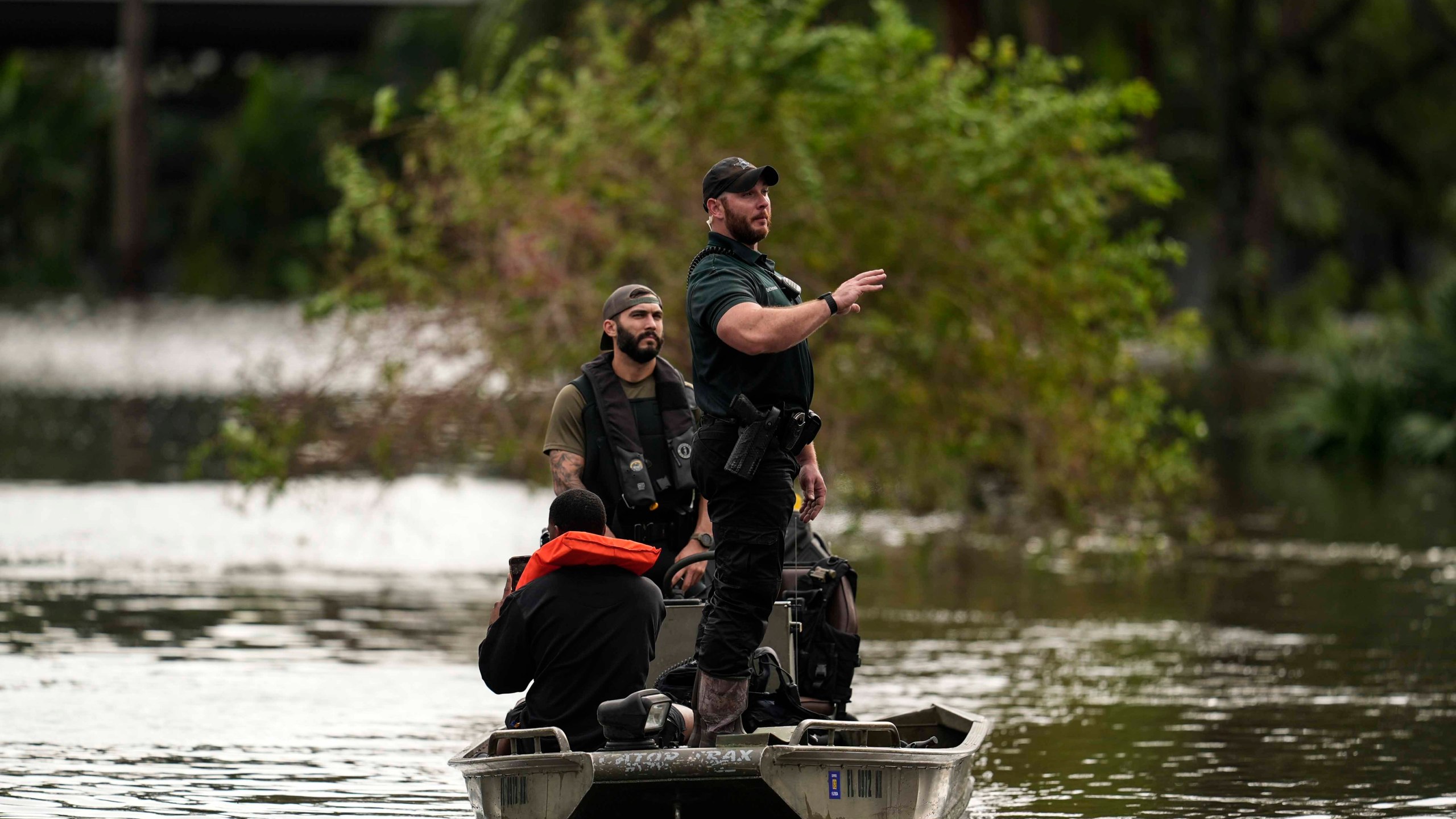 FILE - People are rescued from an apartment complex after flooding in the aftermath of Hurricane Milton, Oct. 10, 2024, in Clearwater, Fla. (AP Photo/Mike Stewart, File)